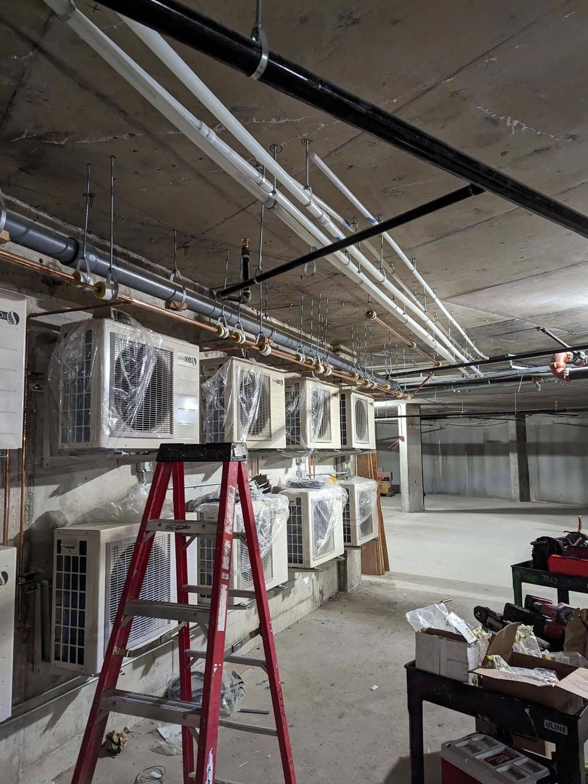 Mechanical Room Heat Pump Installation in a Commercial Parkade