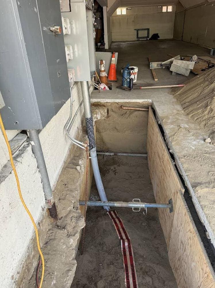 Utility Trench for New Electrical and Water Service Conduit