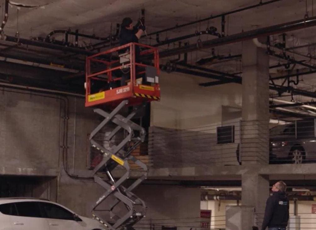 Overhead Plumbing Installation in a Commercial Parkade